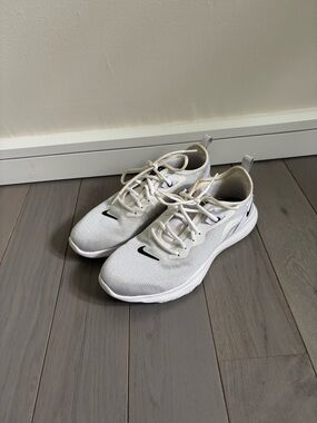 Nike White Mesh Sneakers with Black Swoosh
